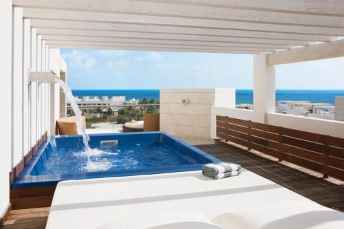 Beloved Playa Mujeres balcony plunge pool