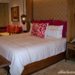 King bed in Preferred Club Jr. Suite Swim-Out
