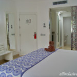 View of the door and bathroom area