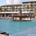 Beachfront infinity pool swim-up bar Dreams Playa Mujeres beachfront infinity pool swim-up bar