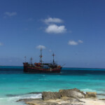 Jolly Roger pirate ship sailing past the resort