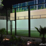 Tennis courts lit at night Hotel Xcaret Mexico Lit Tennis Court