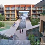 View from the top of the lobby stairs towards the main pool and sea Hotel Xcaret Mexico view from the lobby stairs