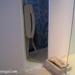 Bathroom phone located between the toilet room and the shower Hotel Xcaret Mexico Bathroom Phone