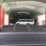 The white shuttle buses that take you around the resort Barcelo Maya Grand shuttle transport