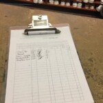 Signing out mini-golf equipment at Strikers Barcelo Maya Caribe mini-golf