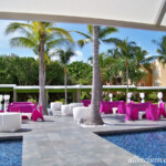 Outdoor seating at the Beach resort's lobby bar Barcelo Maya Beach lobby bar outdoor seating