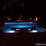 Swim-up terrace at night Barcelo Maya Caribe Swim-Up Suite terrace