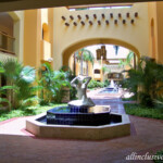 Guest room building courtyards at the Palace Barcelo Maya Palace courtyards