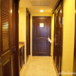 His 'n hers closets to the left, bathroom door to the right Barcelo Maya Palace Premium Jr. Suite