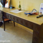 Large desk in the bedroom Barcelo Maya Palace Jr. Suite bedroom