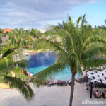 Oaxaca building balcony view Barcelo Maya Palace Premium Jr. Suite balcony view