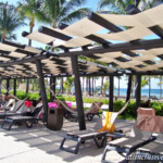 Poolside shade at the Palace Barcelo Maya Palace poolside shade