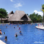 Beach resort pool and swim-up bar Barcelo Maya Beach pool