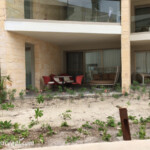 Ambassador Suite Swim-Ups perhaps? This one is on the corner with different terrace furniture/amenities Grand Palladium Costa Mujeres Swim-Up Suites