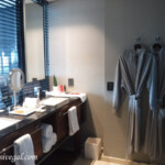 Renovated bathroom--notice the blinds. You can now see the ocean from the bathroom. Live Aqua Beach Resort Cancun renovated bathroom