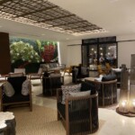 Adjacent seating for non-upgraded lobby check-in