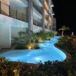 Preferred Club Swimout Suite pool at night