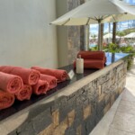 You can pick up a pool towel outside of building 3