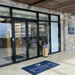 Entrance to Preferred Club Lounge. Notice the container of umbrellas