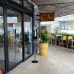 Coco Cafe entrance with some outdoor seating
