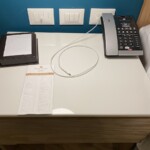 Plug-ins and light switches bedside