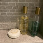 Bathroom amenities include a bar of soap, shower gel, and shampoo