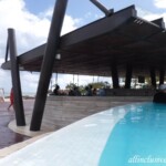 The adults-only pool with the swim-up bar and swing bar on the other side