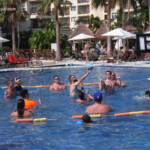 Pool volleyball COVID-style in the activities pool