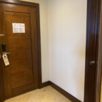 Entryway, bathroom door to the right