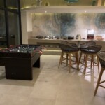 Lounge Bar limited snack offering setup against the wall